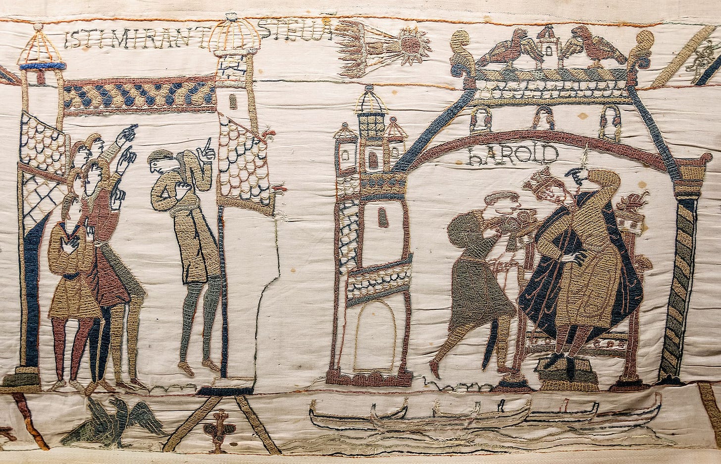 The Bayeux Tapestry. A panel embroidered with the image of men staring up at Halley's Comet while Harold seizes the English throne. The Bayeux Tapestry. A panel embroidered with the image of men staring up at Halley's Comet while Harold seizes the English throne.