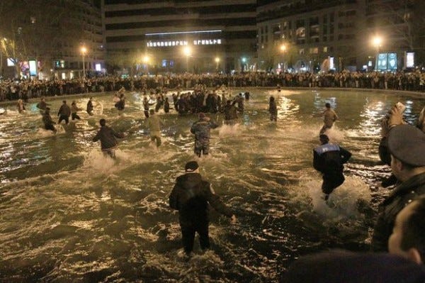 kanye west fans jump into swan lake 2015 kanye west fans jump into swan lake 2015