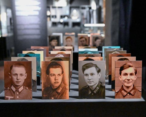 Photos of young men in military uniforms from Our Boys: Inhabitants of Gdańsk Pomerania in the Third Reich Army at the Museum of Gdańsk. 