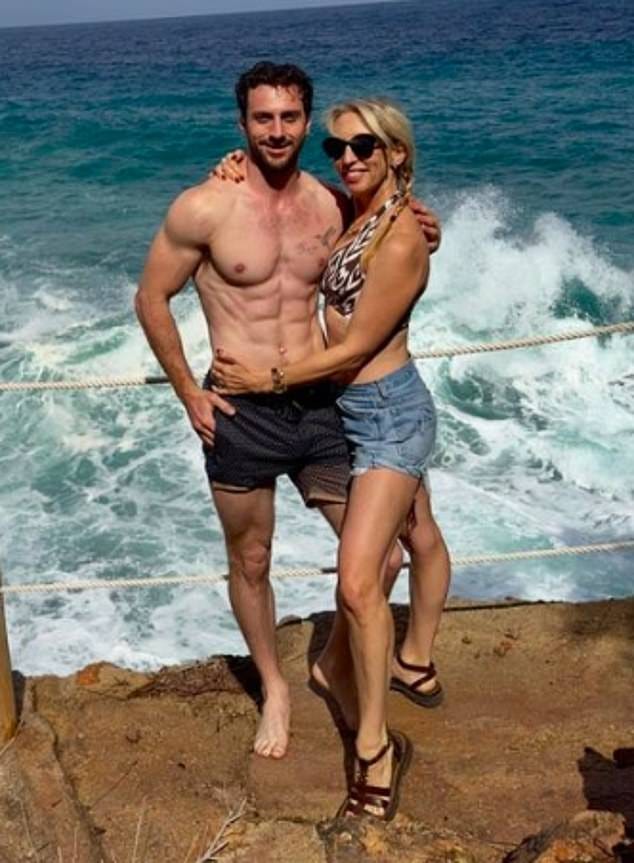 Aaron Taylor-Johnson, 34, and his wife Sam, 57, link arms as they step out  during PFW after sharing jaw-dropping beach snaps on romantic getaway |  Daily Mail Online