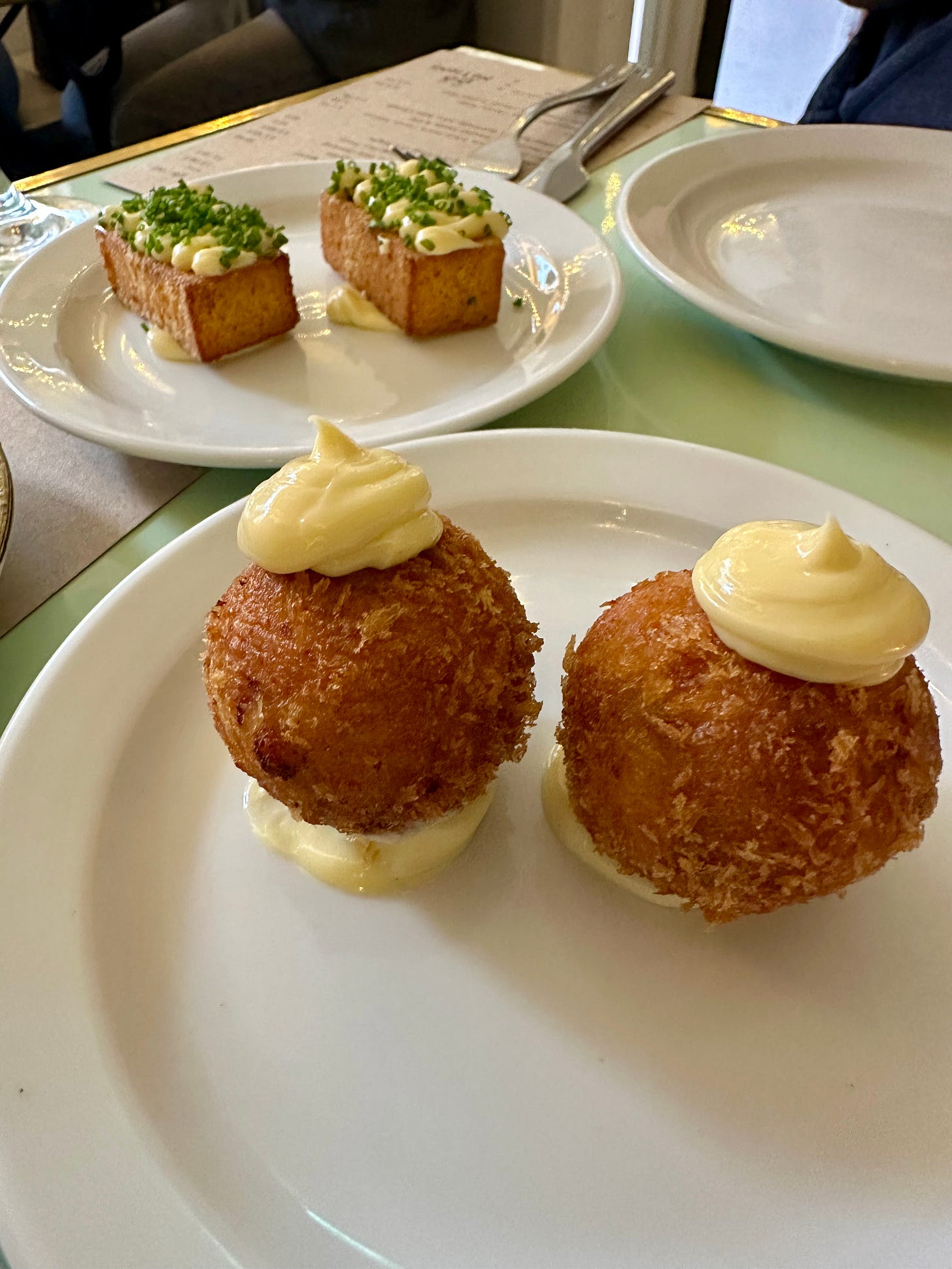 Polenta chips and ham hock croquettes at Two Pups Notions