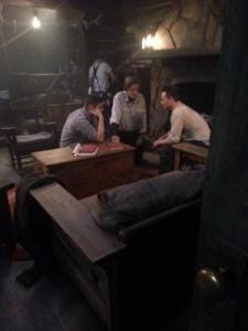 Travis and Jensen consult with director Badham (tweet TravisAaronWade) Travis and Jensen consult with director Badham (tweet TravisAaronWade)