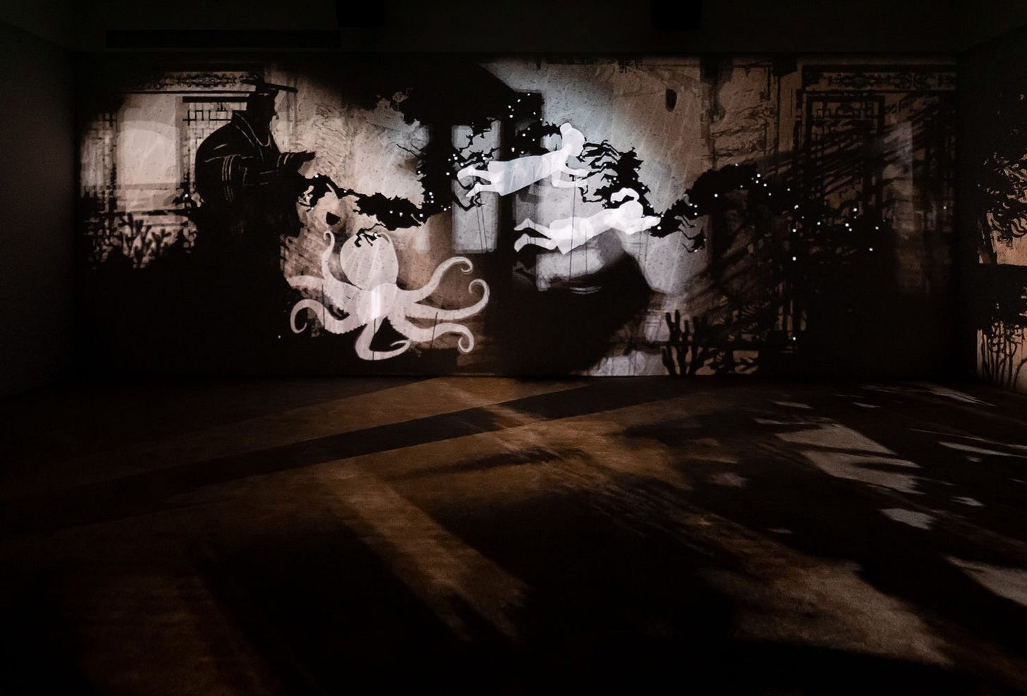 Image of multimedia installation with elements of shadow puppetry Image of multimedia installation with elements of shadow puppetry