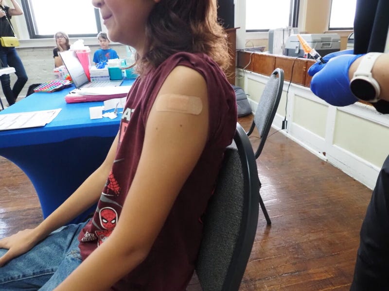 A nurse vaccinates a child at the Latino Community Development Agency on July 9, 2026, in Oklahoma City. As vaccination rates decline nationwide, measles cases have surpassed 2025 to the highest since the disease was declared eliminated in the U.S. in 2000. (Photo by Courtney Bell/Oklahoma Voice)