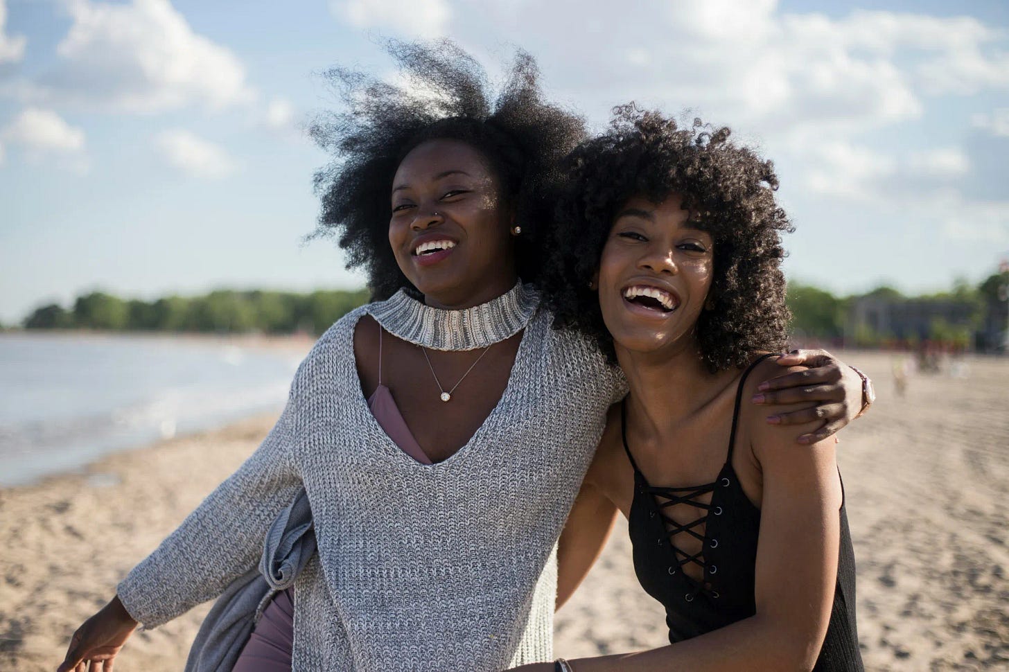 two women together, smiling