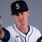 How much better is Emerson Hancock?