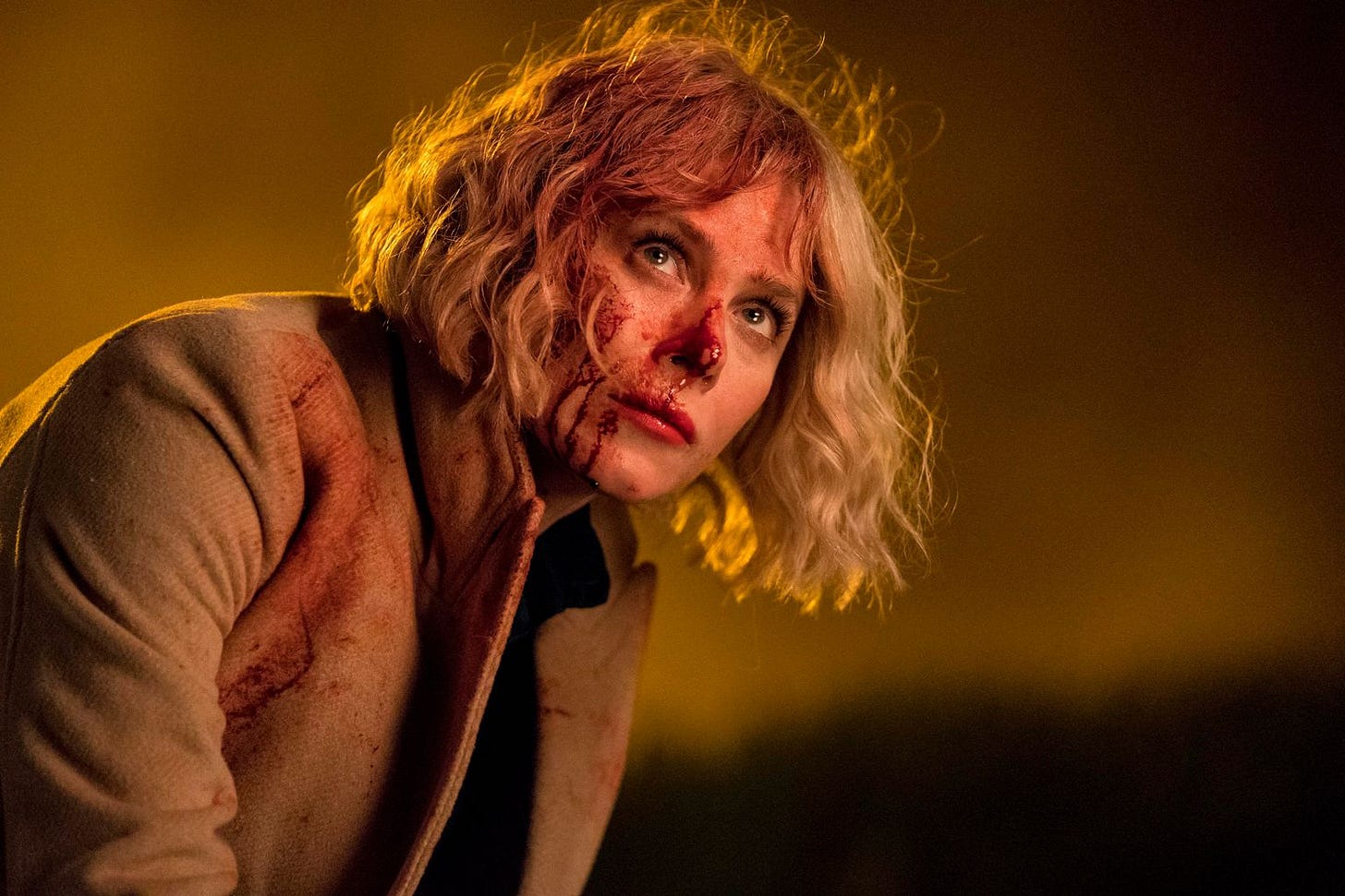 Marcella with blood on her face