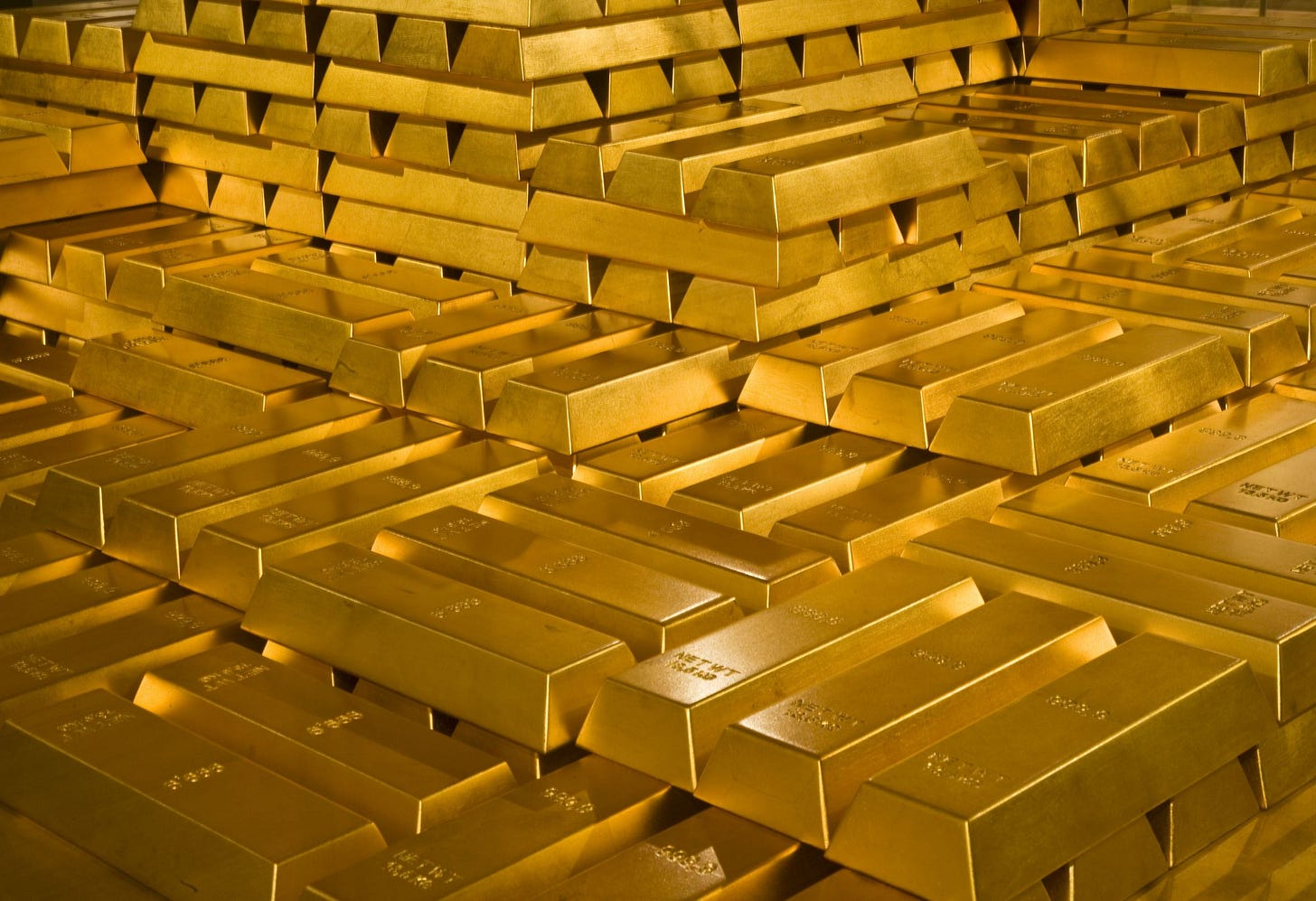 photo of piles of gold bars