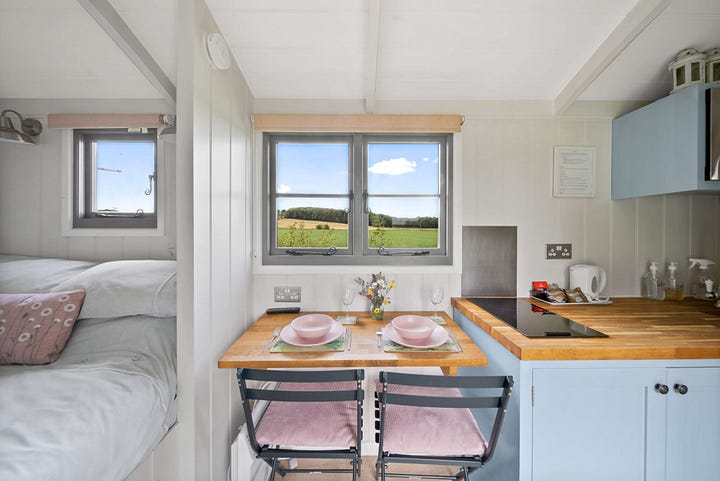 kitchen diner area and bedroom of the shepherds hut