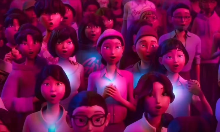 Still from KPop Demon Hunters showing a crowd of fans at a concert, chests glowing with magical light