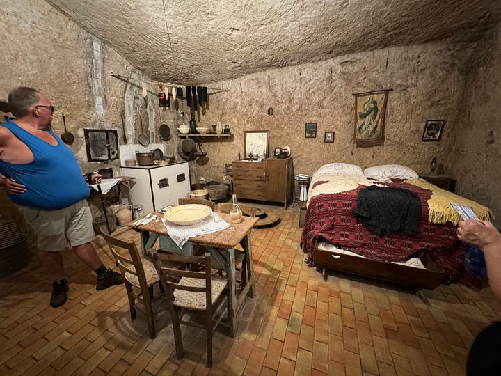 Photos of the old city, a cave house, and the pedestrian piazzas and walkways.