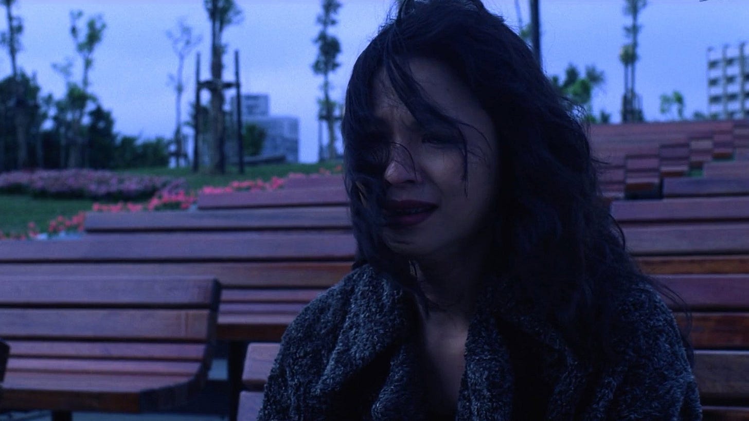 Vive L'Amour | Still features Yang Kuei-mei as May Lin weeping.