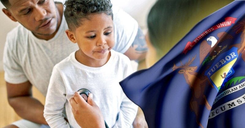 father and son at doctor