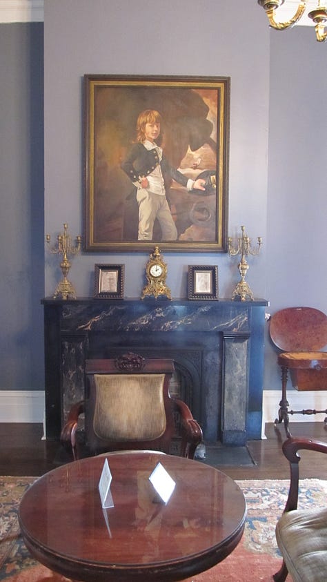 Interior photos of Nottoway, showing a fireplace, the dining room table with dishes, the ceiling and a bedroom.