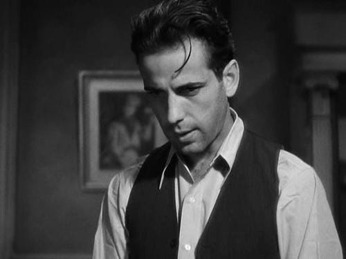 r/classicfilms - Humphrey Bogart in his first ever gangster role in Three on a Match (1932) - the screen practically sizzles