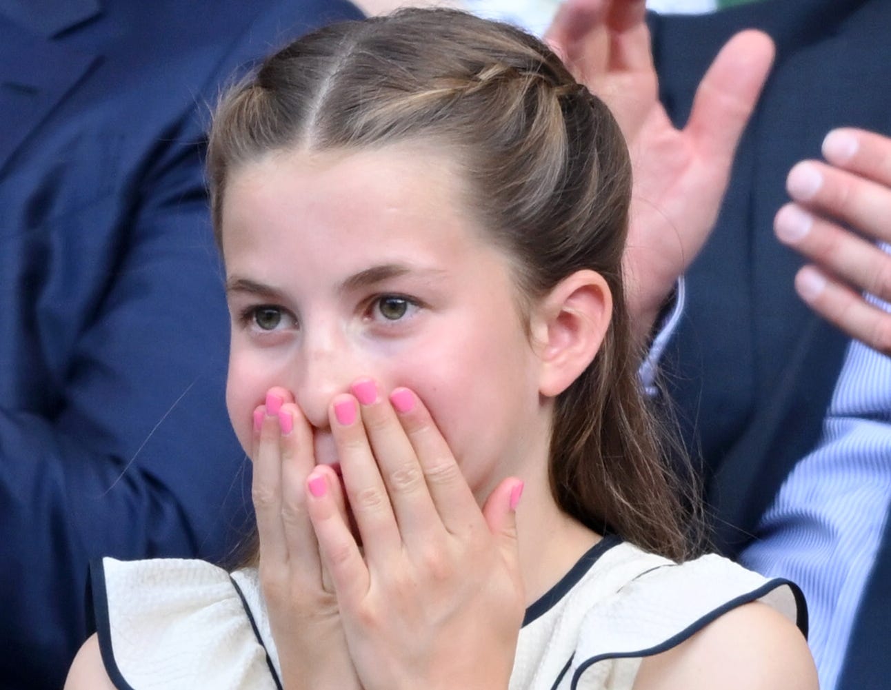 Princess Charlotte looking shocked with pink nails