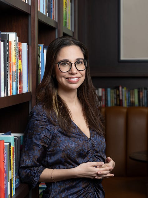Three author photos of Alia taken by Beowulf Sheehan. In all three, she is surrounded by books.