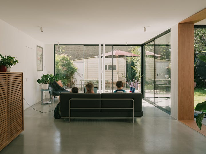 Colourful home, dining room, kitchen, open-plan interior, skylight, wood flooring, herringbone flooring