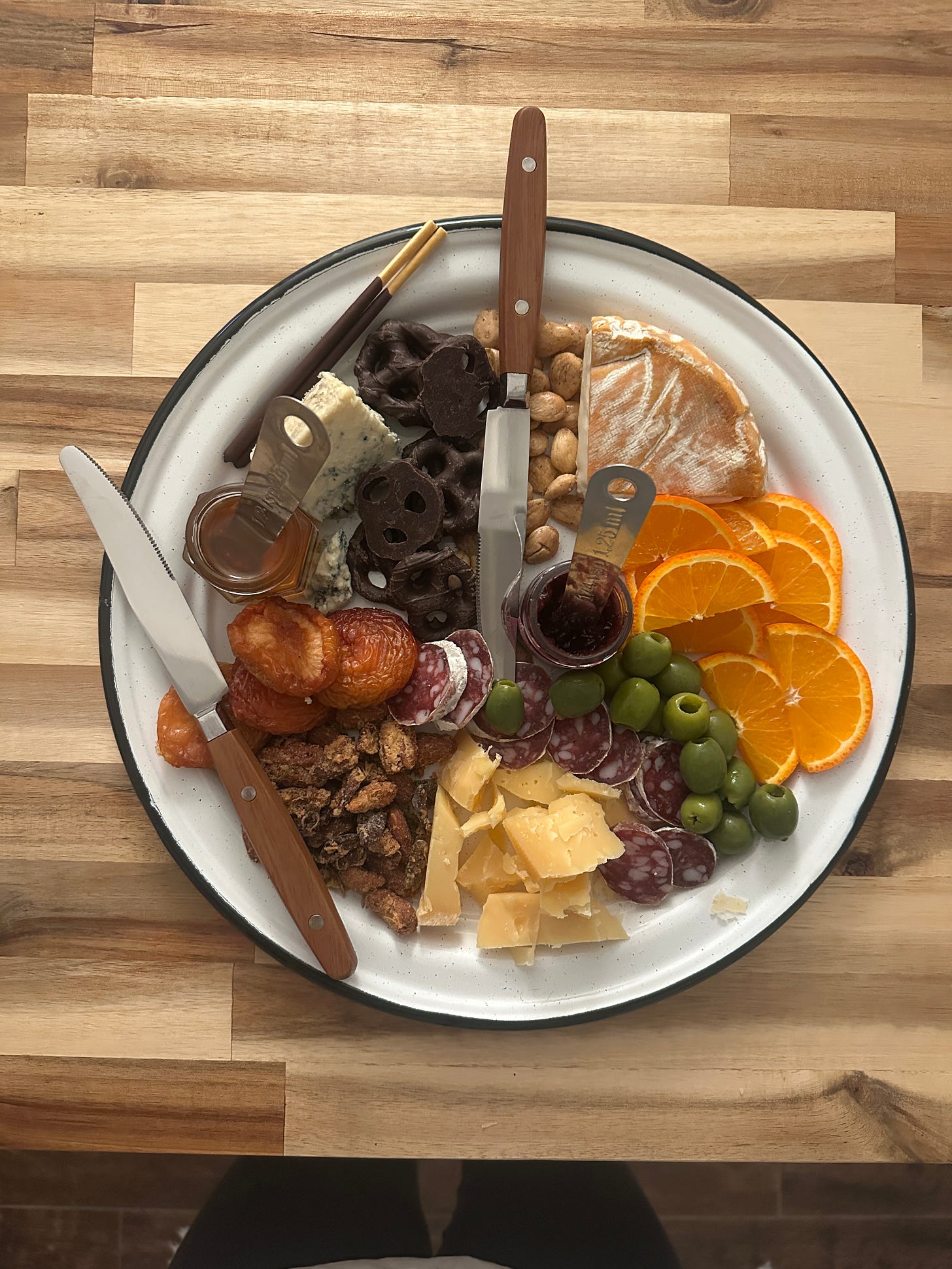 cheese plate on a wood table cheese plate on a wood table