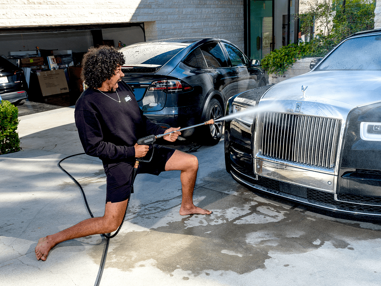 TOKENS OF APPRECIATION Crypto influencer Fluffy who has his own meme coin tends to household chores.