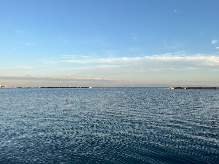 4 photos of Suma Beach at sunset, with views across Osaka Bay and to Awaji Island