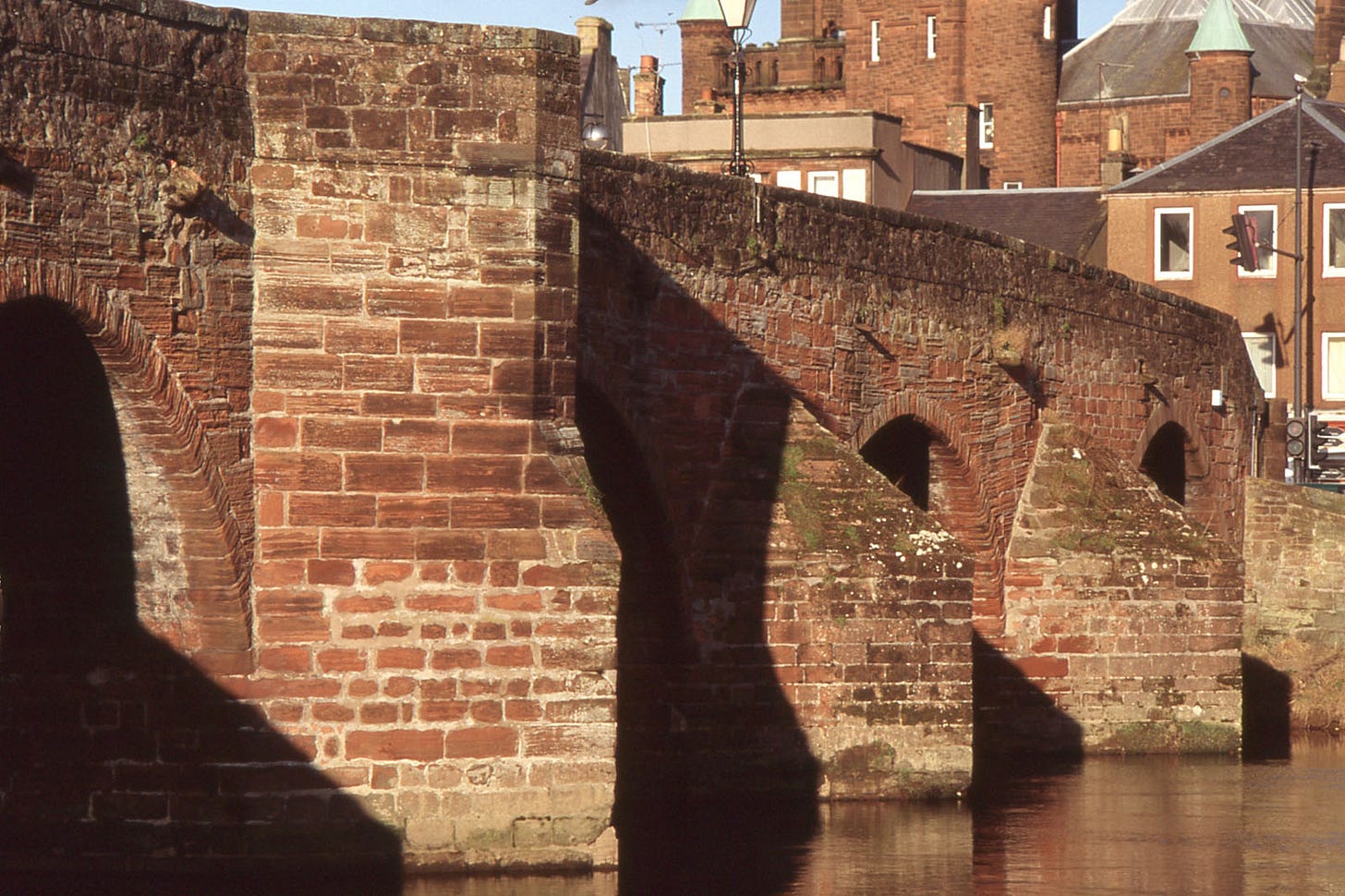 stone arch bridge over river