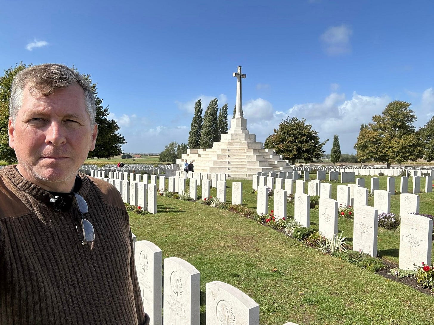 May be an image of 2 people and monument