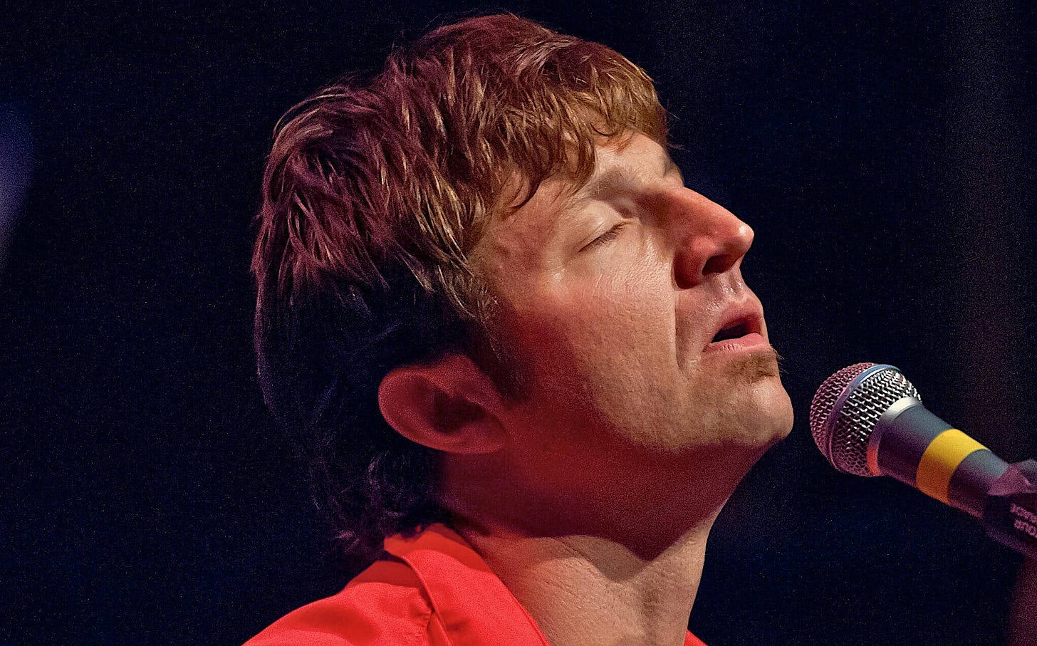 Gentry Bronson singing during a performance in 2012