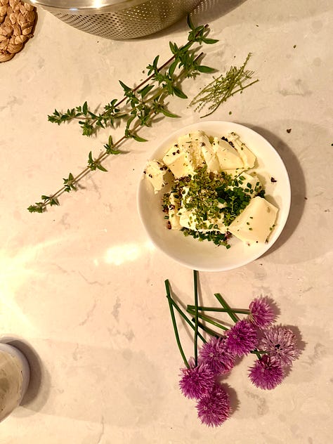 photo of garden chives and chive blossoms and homemade chive blossom and herb butter
