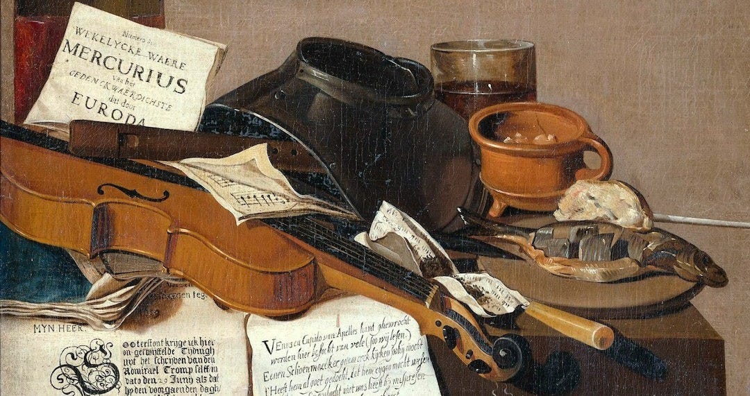 brown and black wooden guitar and black leather bag