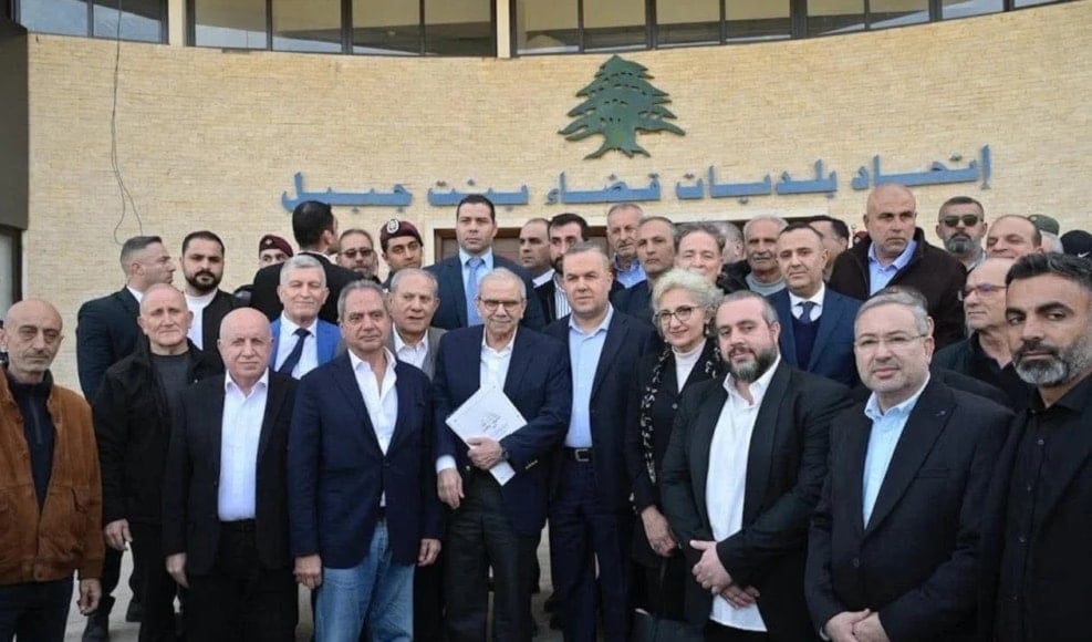 Lebanese MP Hassan Fadlallah stands with Lebanese Prime Minister Nawaf Salam in front of the Bint Jbeil Union of Municipalities headquarters in southern Lebanon, February 7, 2026 (social media)
