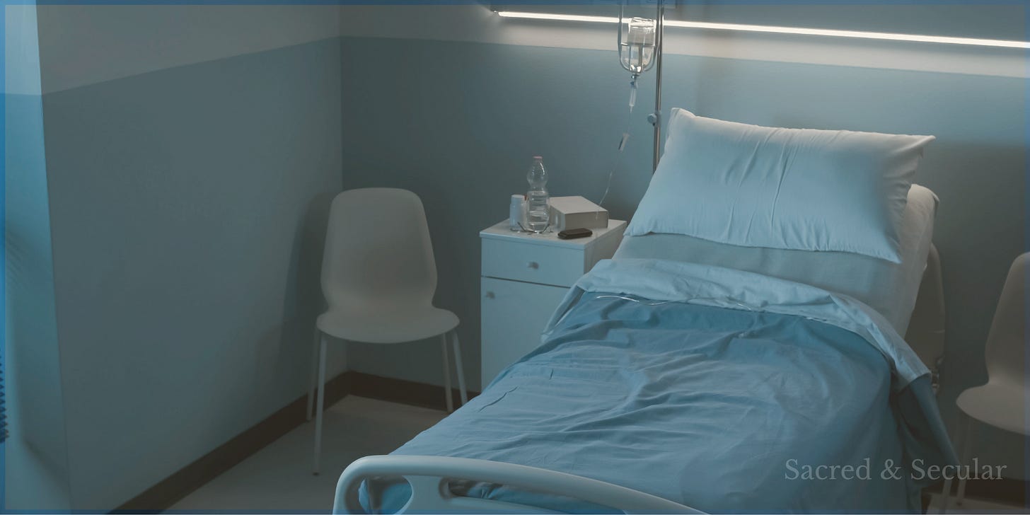 An empty hospital bed beside a window with soft morning light streaming into the room. A single chair sits next to the bed, creating a quiet, reflective scene that evokes waiting, hope and the reality of suffering.