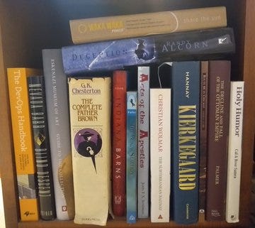 Four photos, each from a different person, showing one or more of my books on their shelves