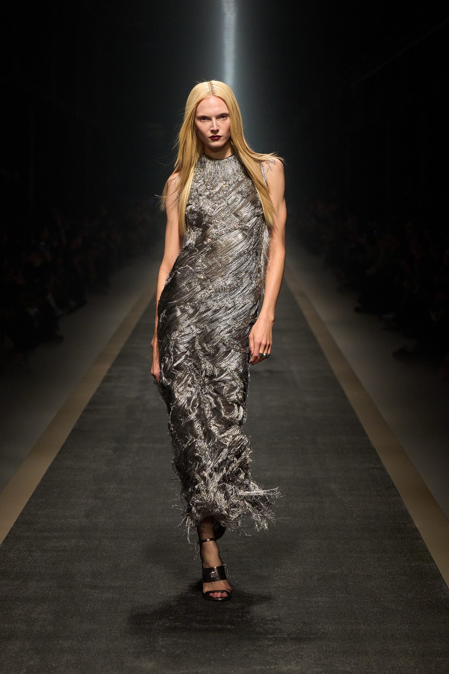 Image may contain Fashion Clothing Dress Adult Person Formal Wear Runway Accessories Jewelry and Ring