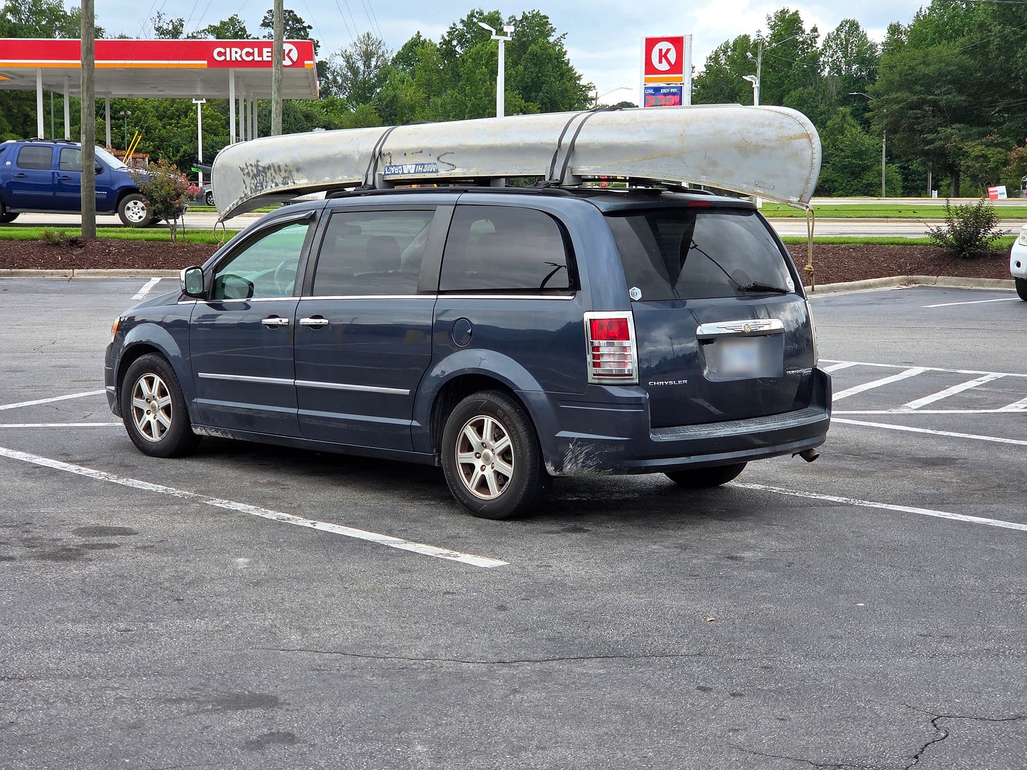Our 342,000-mile Chrysler Town & Country, still the road-trip hauler - canoe on the roof and all Our 342,000-mile Chrysler Town & Country, still the road-trip hauler - canoe on the roof and all