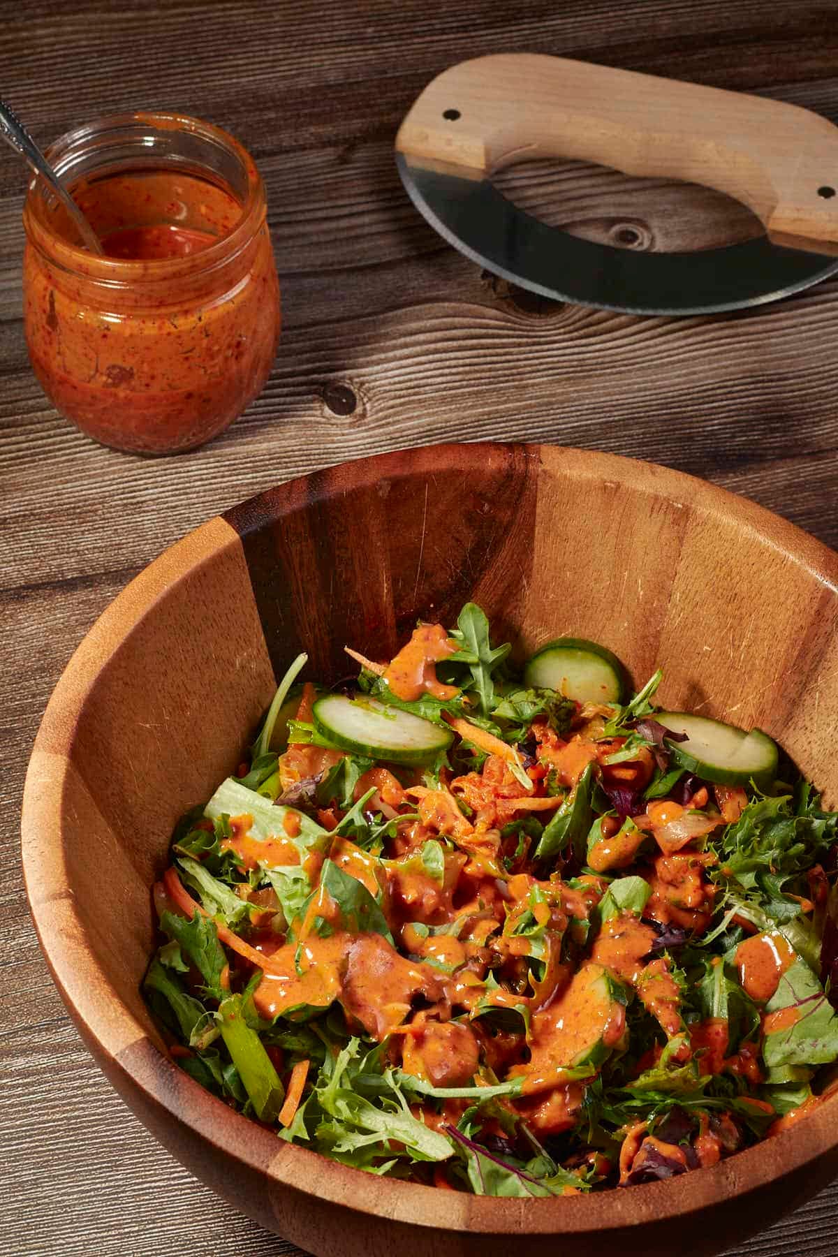big bowl of salad with gochujang salad dressing