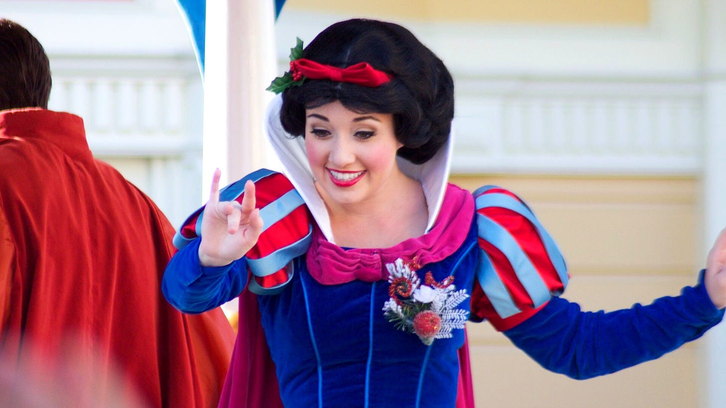 Snow White waves during the Christmas parade at Walt Disney World. Image: H. Michael Miley via Wikimedia Commons Snow White waves during the Christmas parade at Walt Disney World. Image: H. Michael Miley via Wikimedia Commons