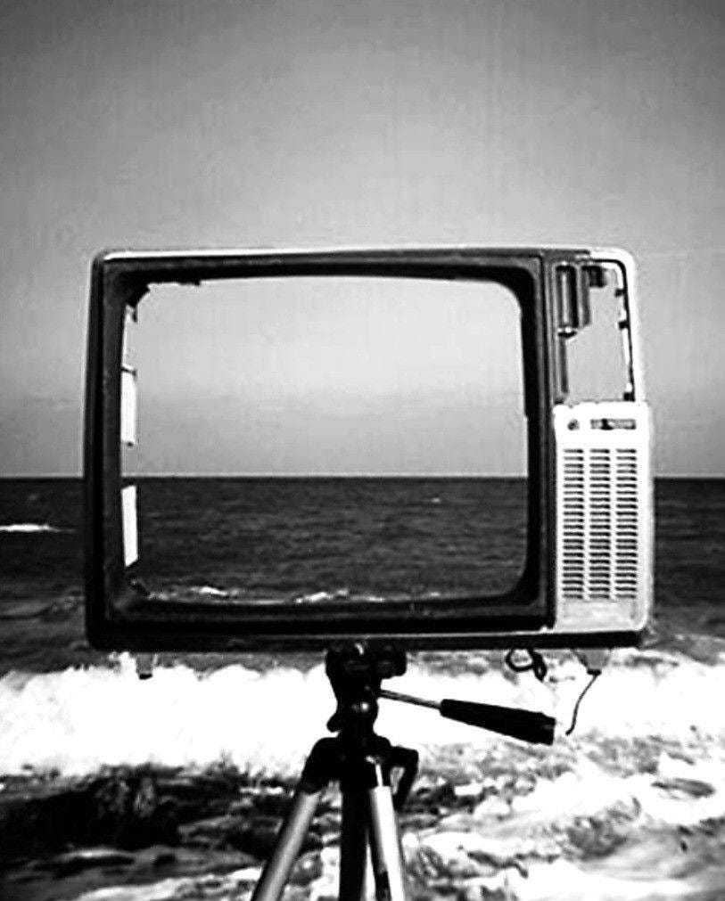 May be a black-and-white image of television and water May be a black-and-white image of television and water