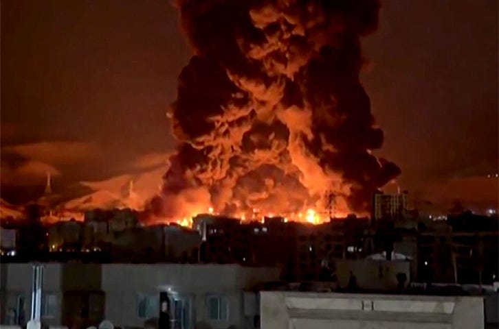 TEHRAN: A massive fireball erupts after an oil depot was targeted by US-Israeli bombing. The destruction of refineries and storage facilities in Iran’s capital precipitated a toxic ‘oil rain’ over the city, with skies darkened by thick black smoke.—AFP TEHRAN: A massive fireball erupts after an oil depot was targeted by US-Israeli bombing. The destruction of refineries and storage facilities in Iran’s capital precipitated a toxic ‘oil rain’ over the city, with skies darkened by thick black smoke.—AFP