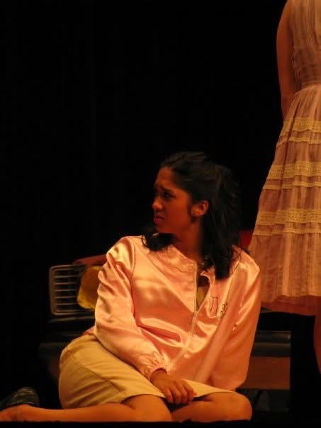 photos of Dr. Kiki in highschool acting as Marty in Grease.