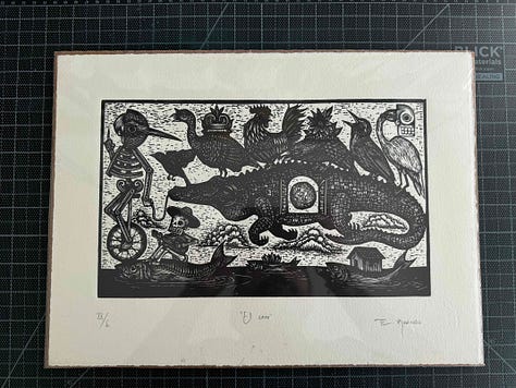 Linoleum prints, a clay print, stickers, and a hand stitched bag
