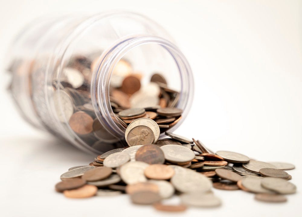 spilled coins from the jar spilled coins from the jar
