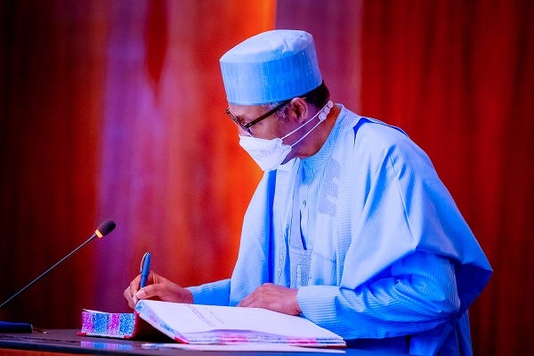 President Muhammadu Buhari signs electoral act