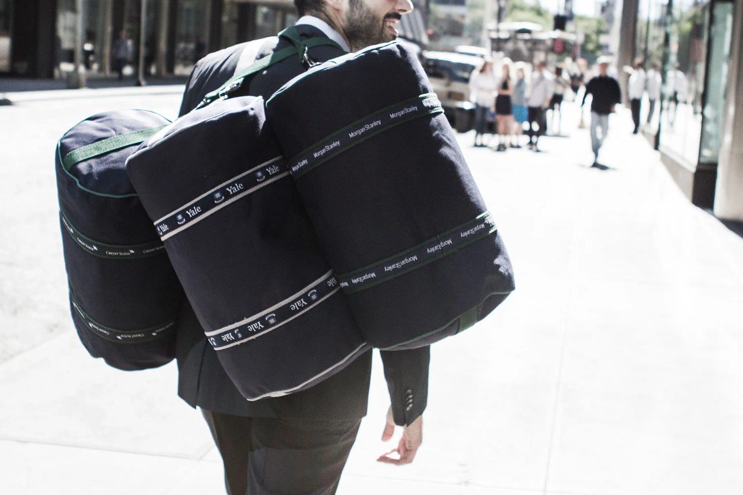 After 23 Years, the Banker Bag Grows Up and Gives Back - Bloomberg