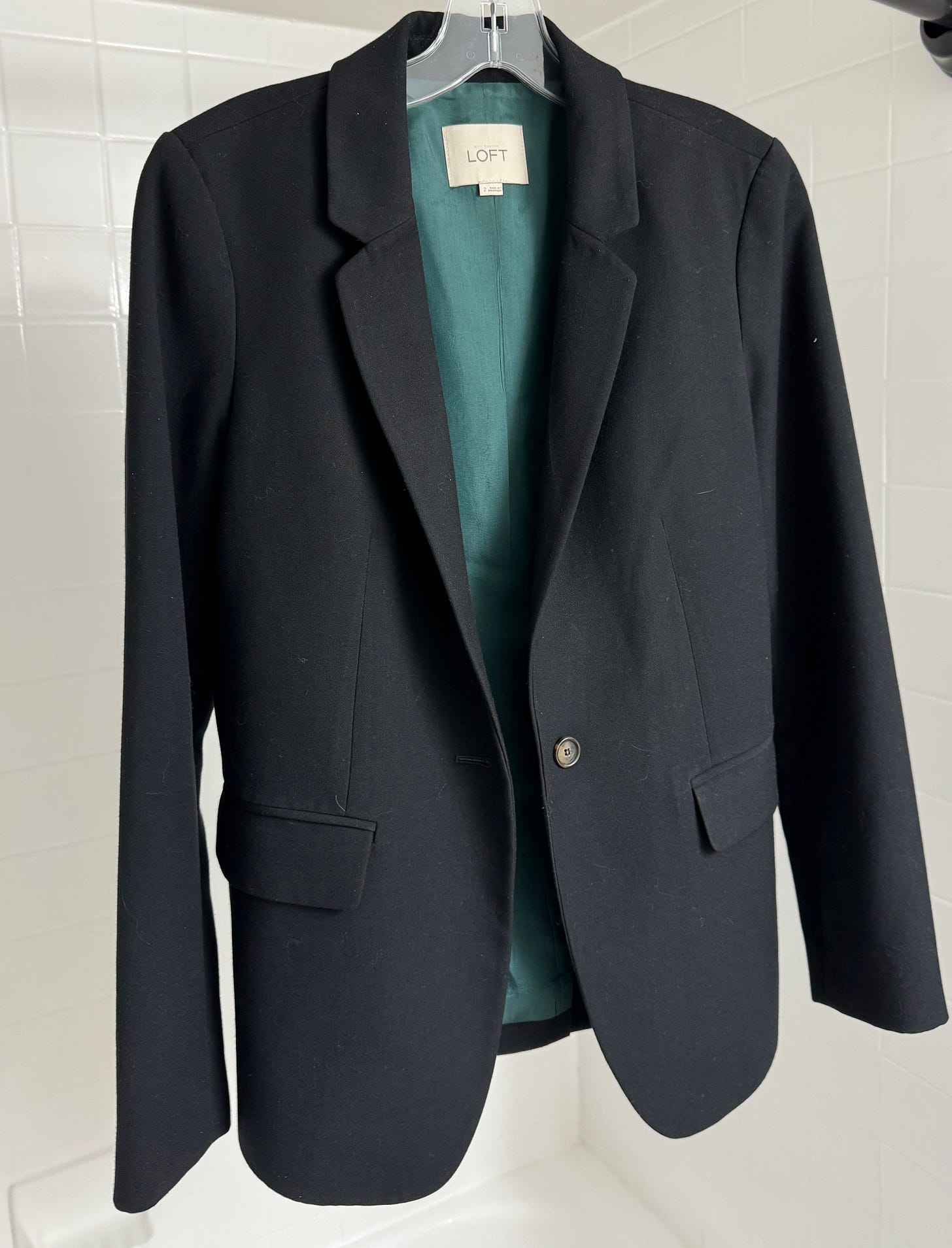 a traditional black blazer