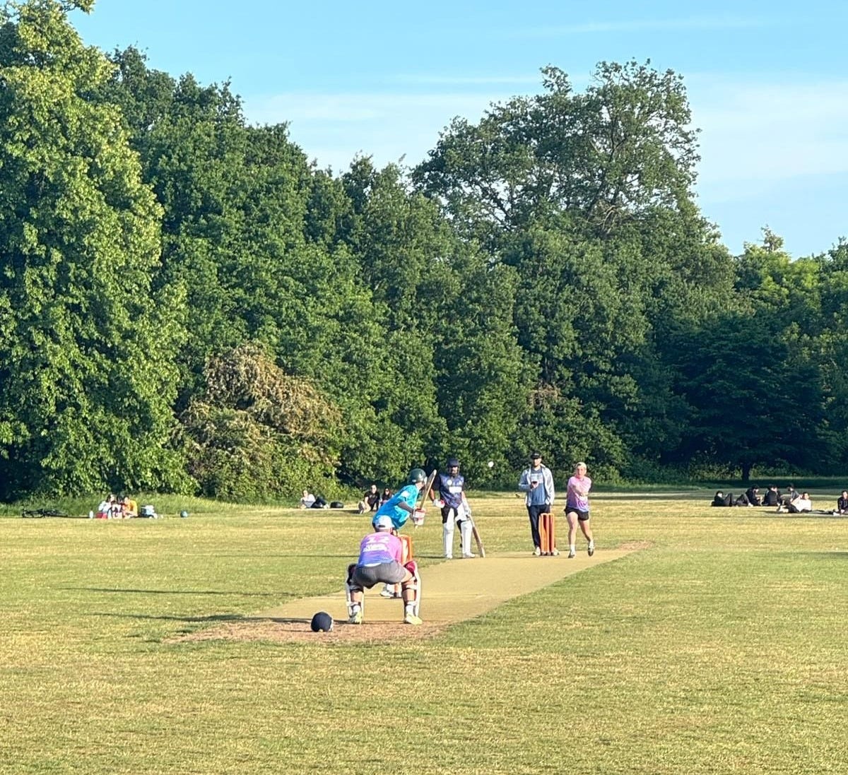 May be an image of 5 people, people playing football, frisbee and grass