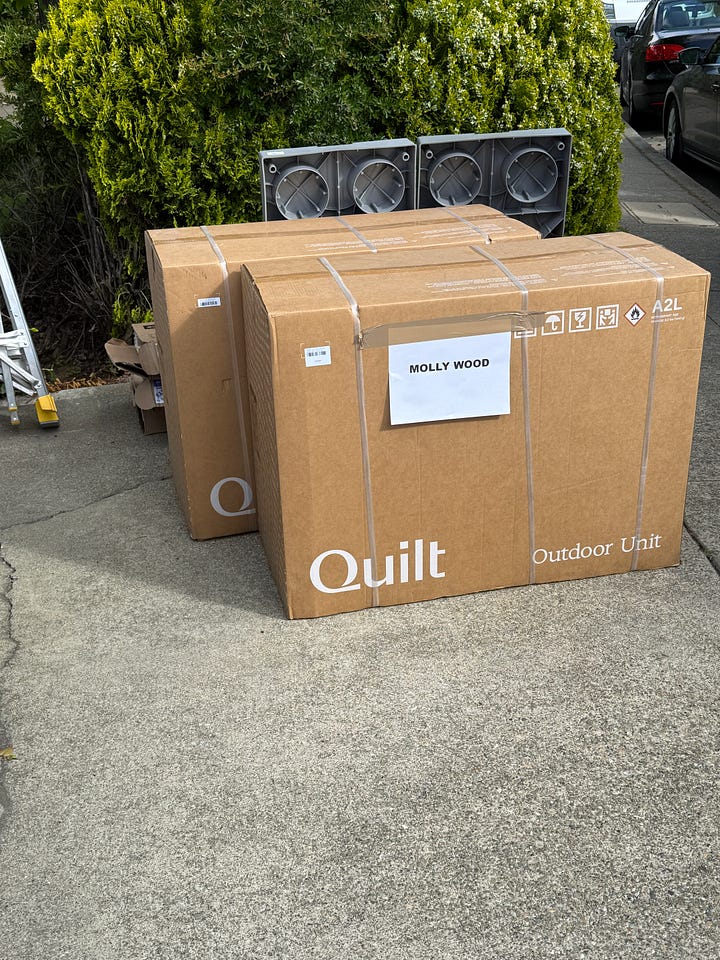 A gallery of photos showing Quilt branded boxes, a worker, ladder, and tools, plus floor covering in the main room, and a photo of a wall showing a white mini-split above a bar cabinet.
