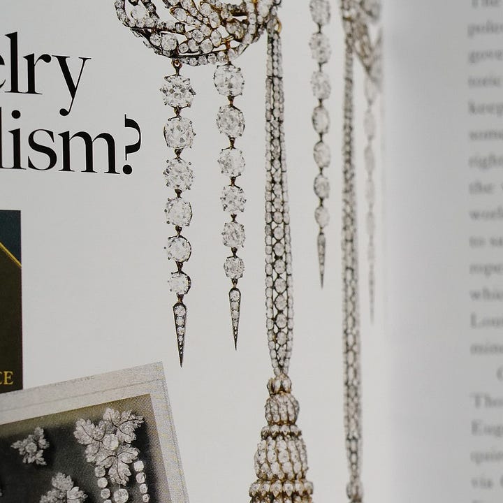Two photos with cover and interior of the book on jewelry.