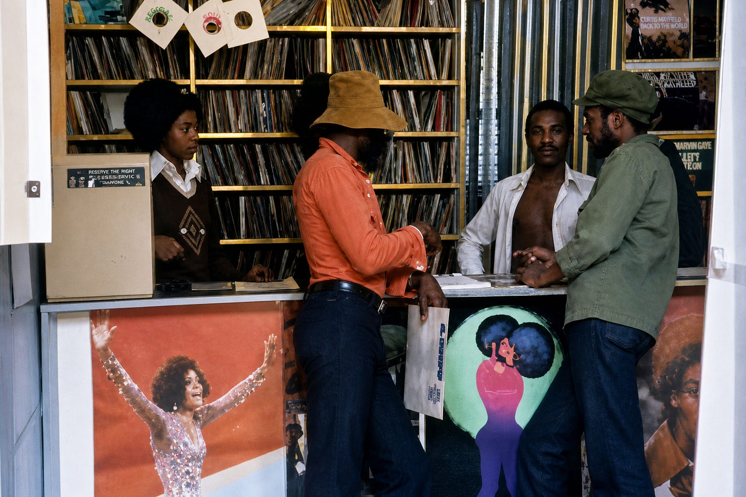 Inside a local record shop, conversation flows as freely as the music, with vinyl-lined walls reflecting a culture finding its voice in rhythm and community.
