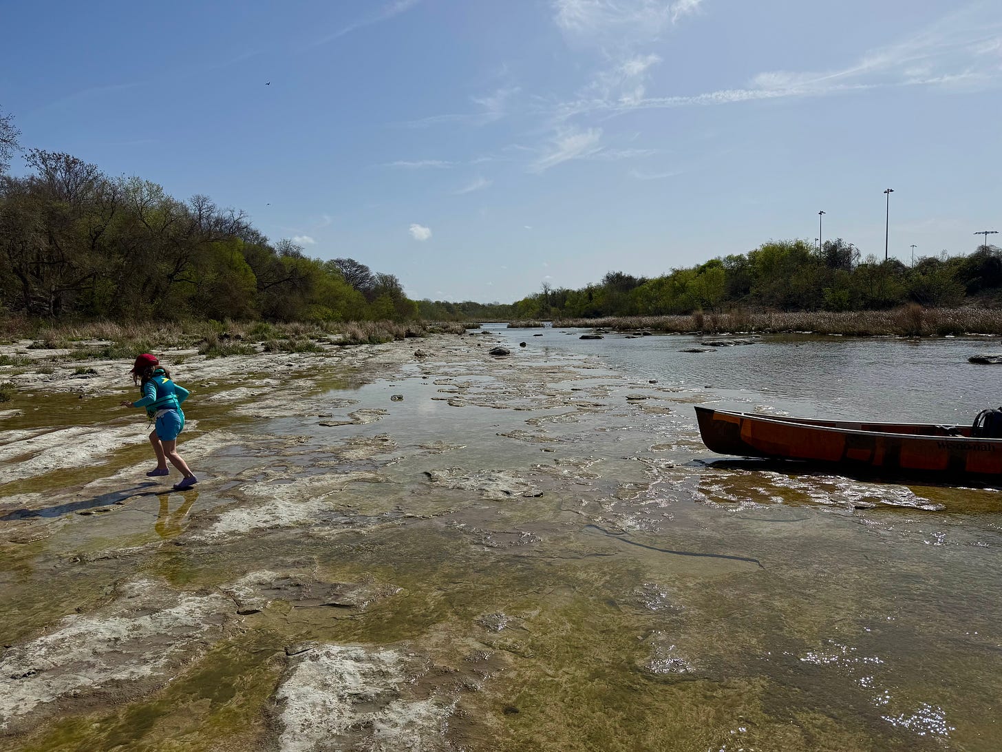 Kid, canoe, river, trees